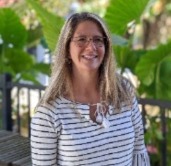 Casey, founder of Booked & Balanced Hosting