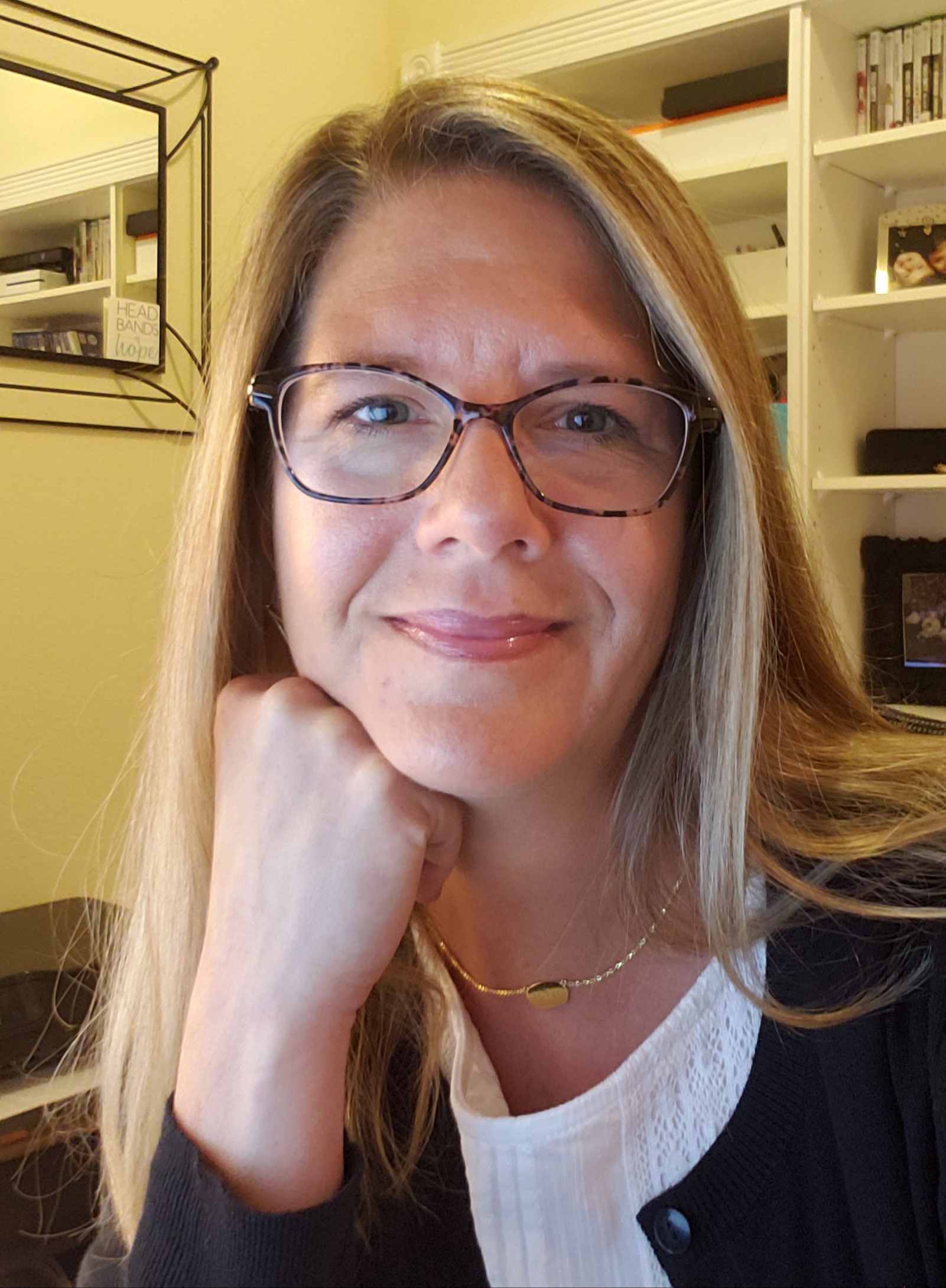 Casey, founder of Booked & Balanced Hosting