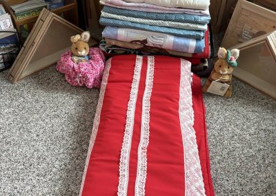 These are some of the 65 quilts that PLCW has sent to Orphan Grain Train.